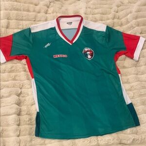 Green and Red Soccer Jersey with Crest and Logo